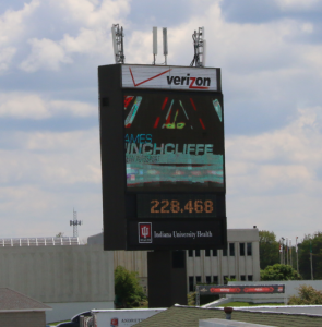 Verizon antennas atop Indianapolis Motor Speedway scoreboard.