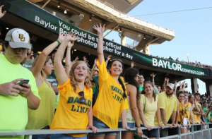 Baylor students standing at football game. Photo credit: Rod Aydelotte, WacoTrib.com