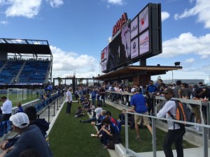 Good view of standing-room area in front of end zone bar. It was packed all game.