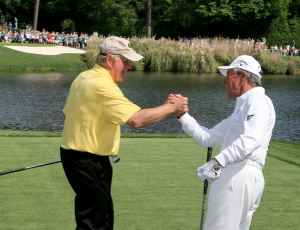 Gary Player (R) congratulates Jack Nicklaus after Nicklaus' hole in one (Sam Greenwood/Augusta National)