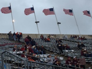 Antennas on flag poles atop seating