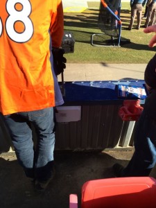 Field-level Wi-Fi AP (small white box next to right leg of Peyton Manning fan)