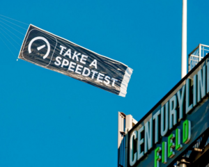 Ookla ad banner being flown over CenturyLink Field in Seattle. Credit: Ookla