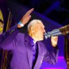 Hall of Fame head coach Bud Grant blows the Gjallarhorn.