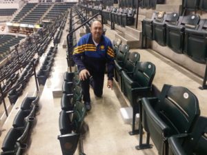Pacers director of IT Kevin Naylor shows off a new under-seat Wi-Fi AP